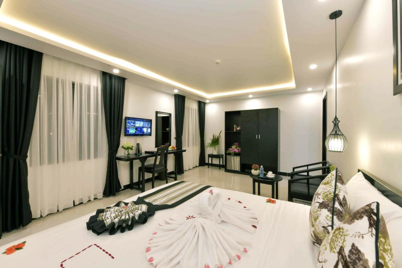 Gem Riverside Hotel Hoi An Bagian luar foto