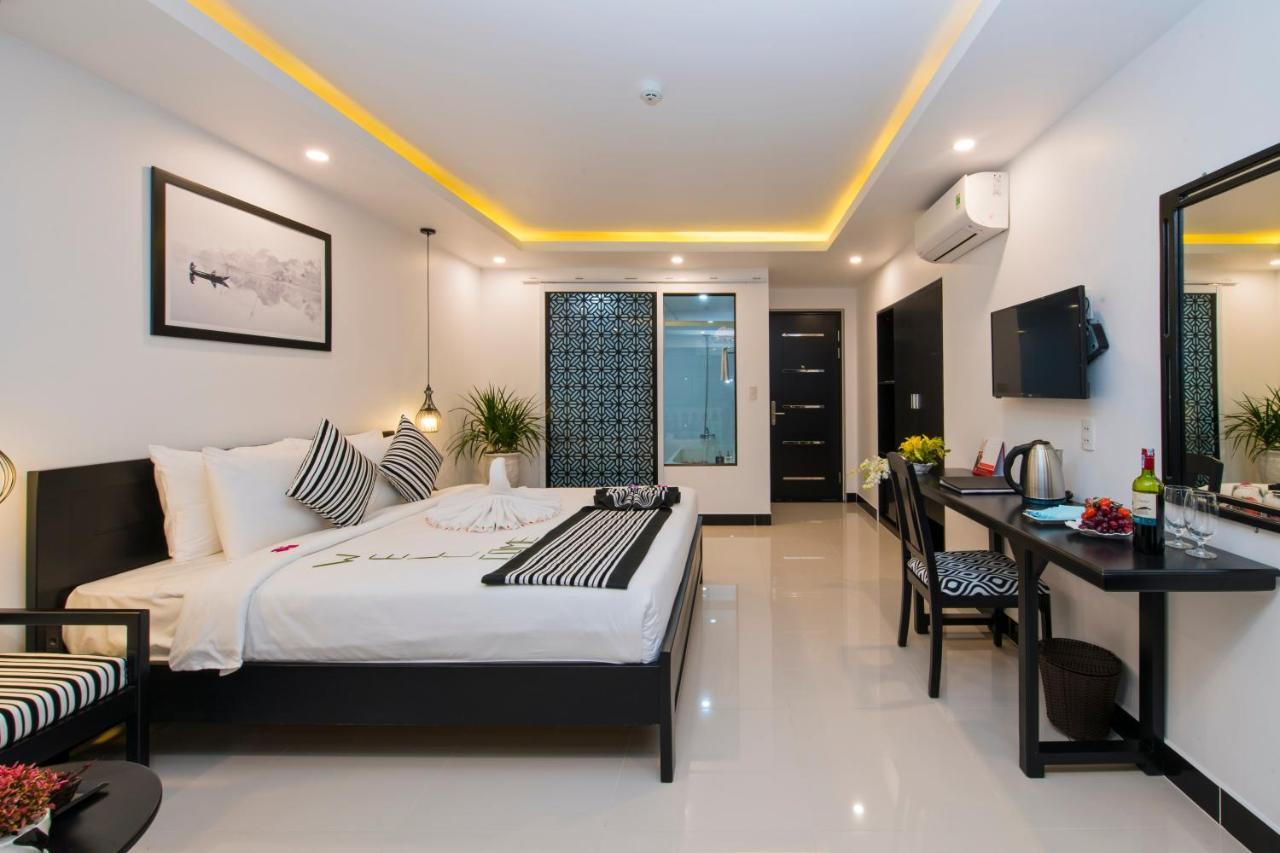Gem Riverside Hotel Hoi An Bagian luar foto
